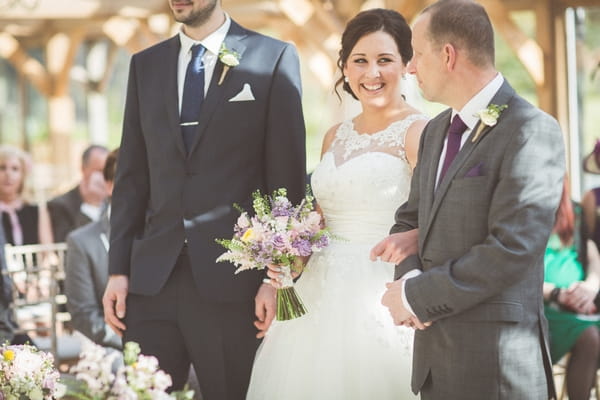 Father with bride at altar