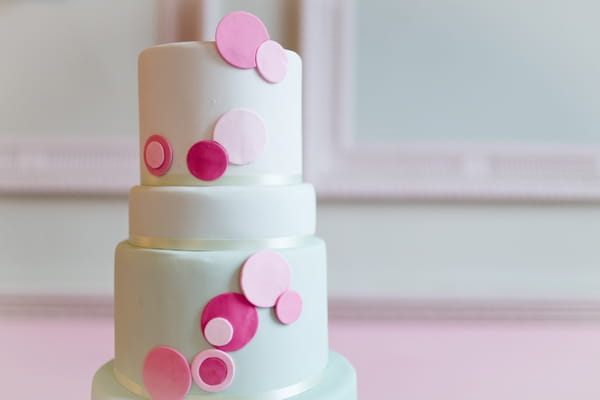 Top of mint coloured wedding cake with spots