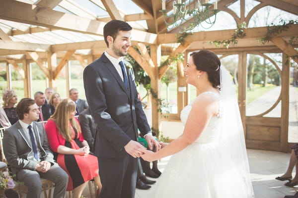 Bride and groom saying vows