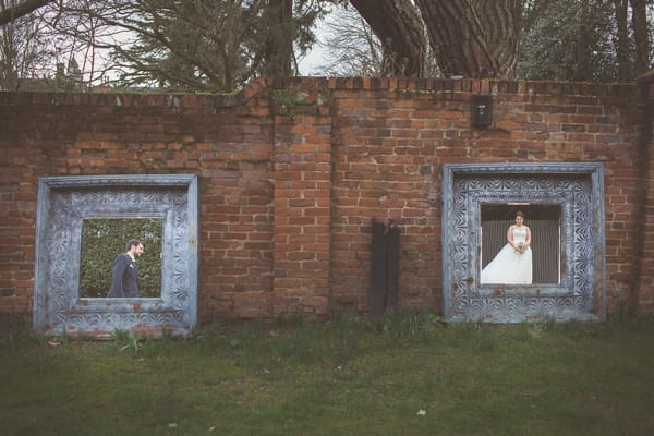 Bride and groom's reflections in mirrors