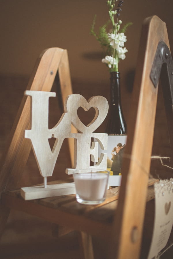 Love sign on top of ladder