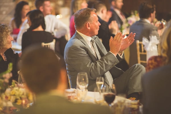 Wedding guests clapping