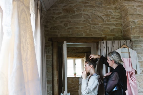 Bride having hair done