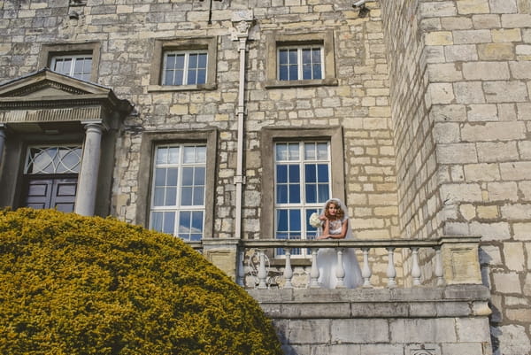 1950s bride on balcony