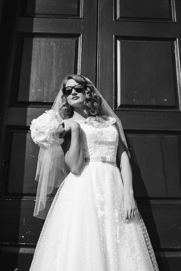 1950s bride wearing sunglasses