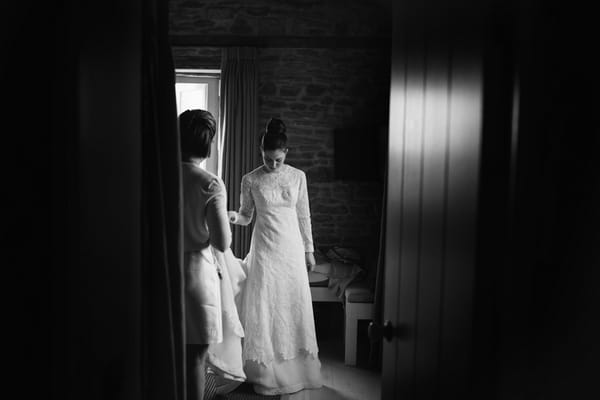 Bride wearing mother's wedding dress