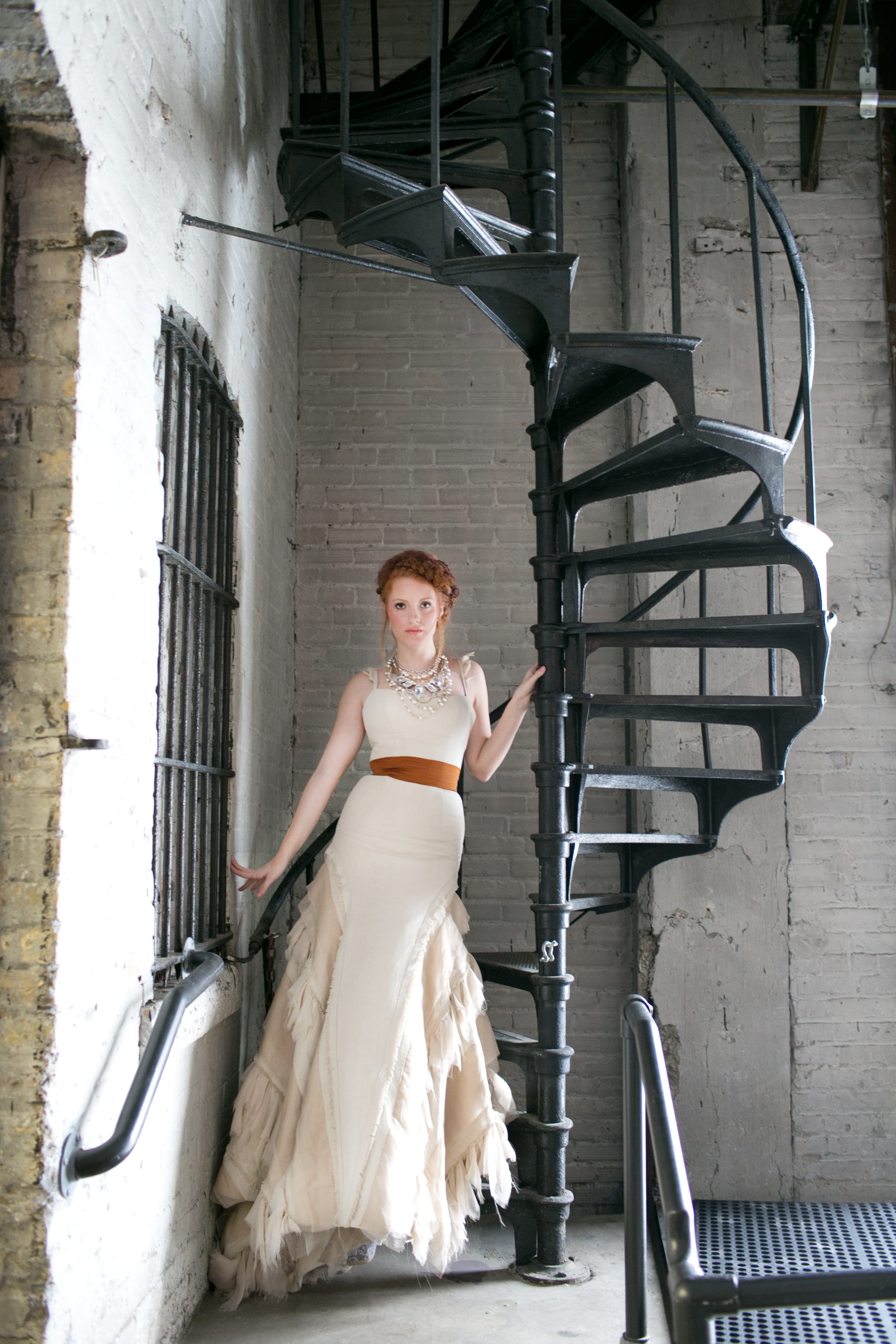Bride on spiral staircase
