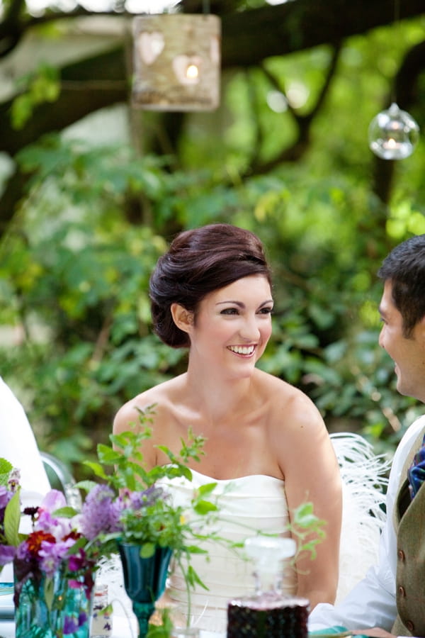 Bride smiling at groom