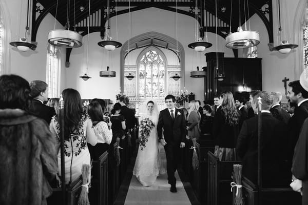 Bride and groom leaving church