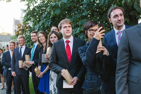 Wedding guests outside church