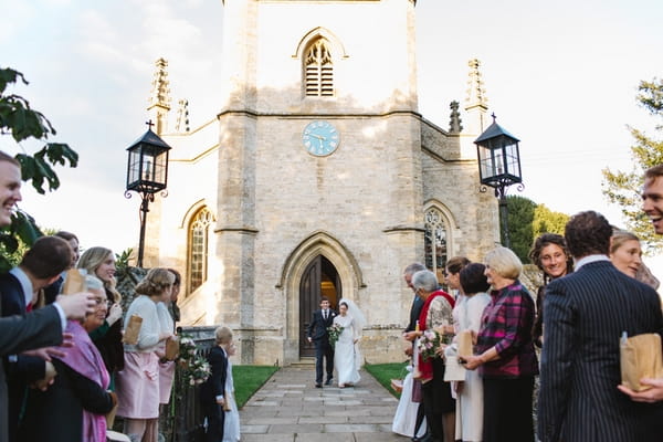 Bride and groom outside church