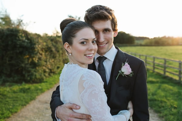 Bride and groom smiling