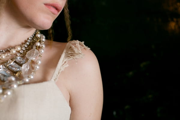 Shoulder strap on bride's dress