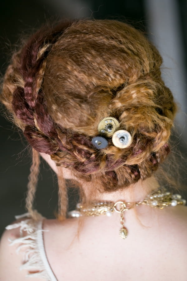 Cogs in bride's hair