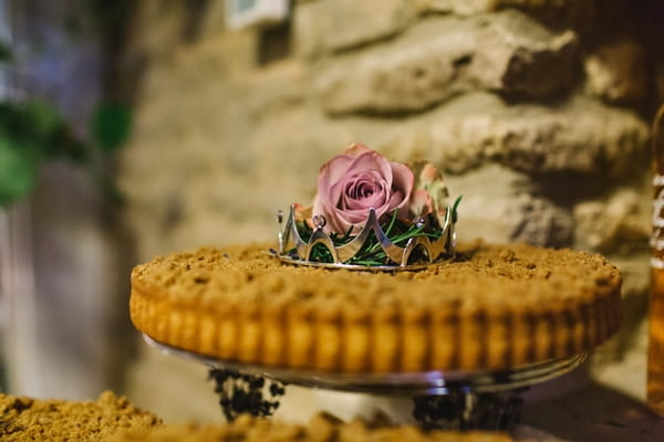 Rose on top of wedding cake