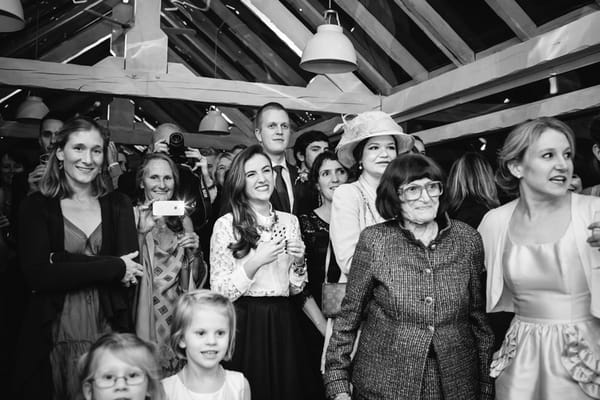 Wedding guests watching dance