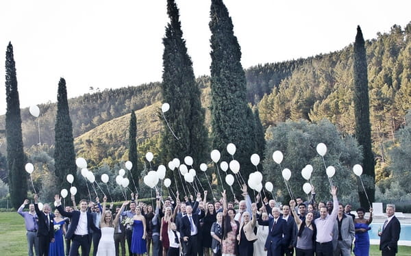 Wedding guests with balloons