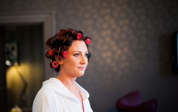 Bride with rollers in hair