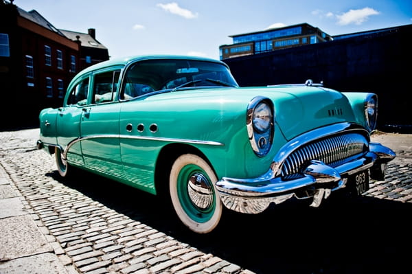 Turquoise Buick wedding car