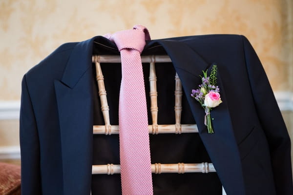 Suit jacket and pink tie