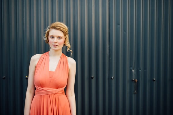 Bridesmaid in coral dress