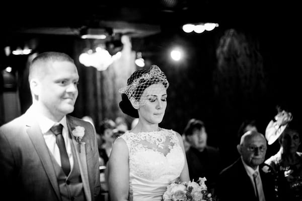 Bride and groom at altar