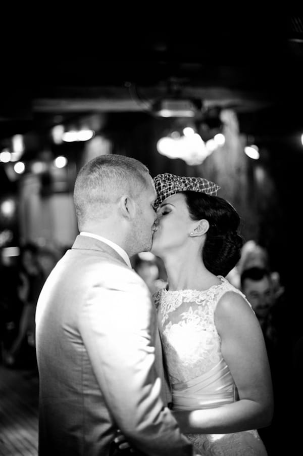 Bride and groom kiss