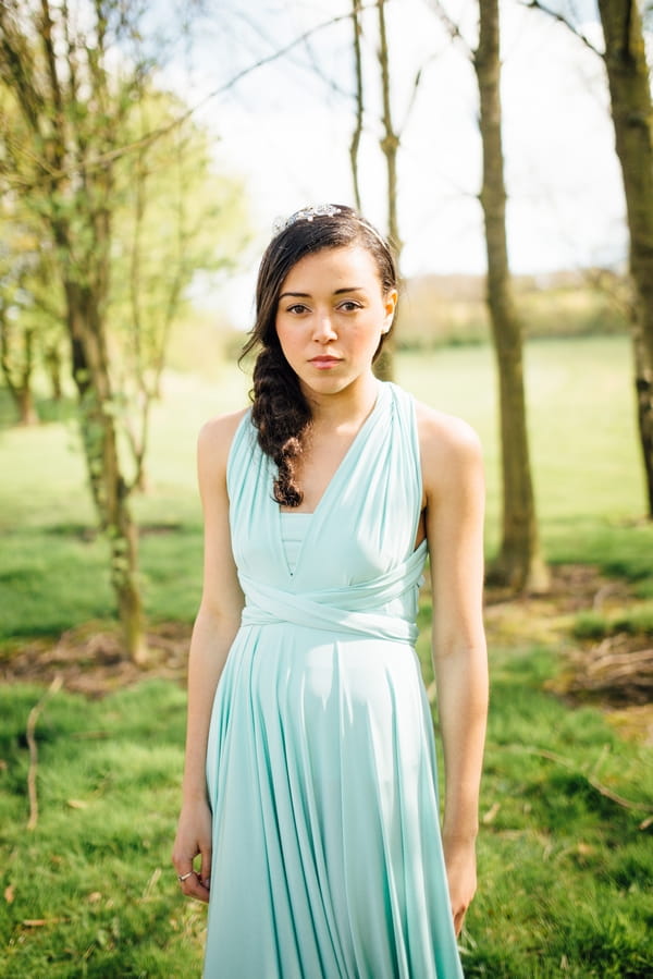 Bridesmaid wearing blue dress