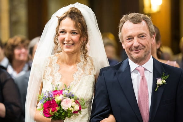 Father walking bride down aisle