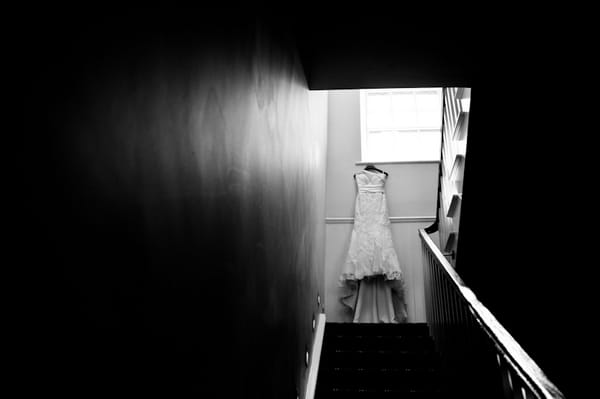 Wedding dress at top of stairs