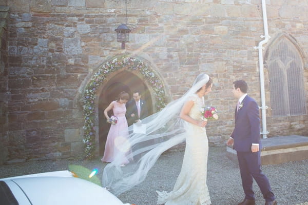 Bride and groom outside church