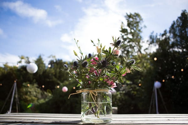 Jar of wedding flowers