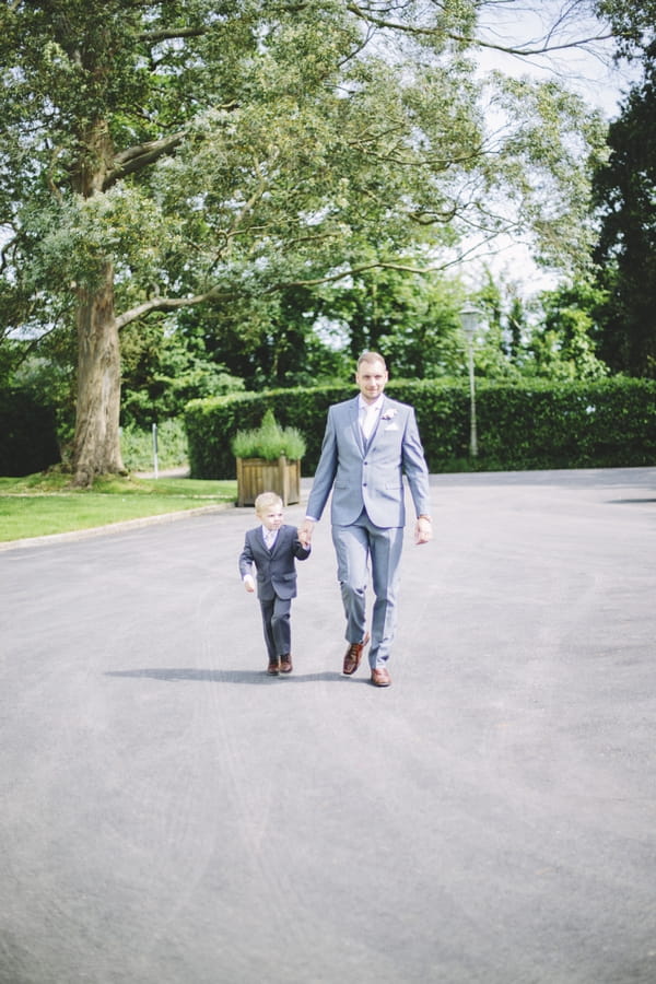Groom walking with son
