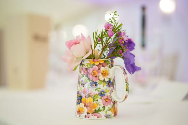 Jug of wedding table flowers