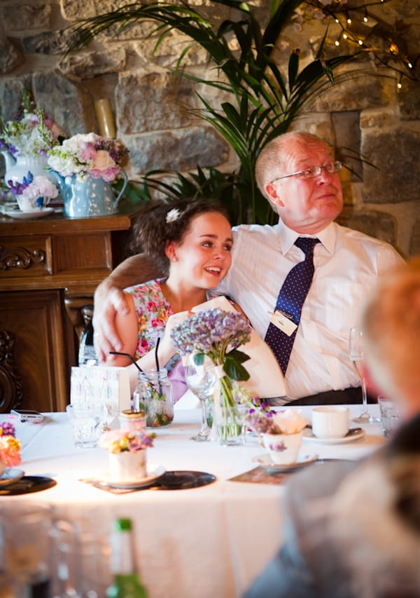 Wedding guests listening to speech