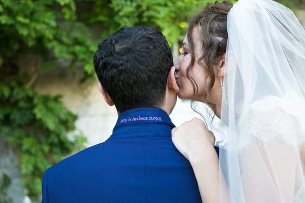 Wedding date under groom's collar