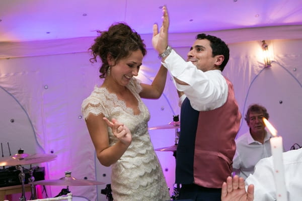 Bride and groom dancing