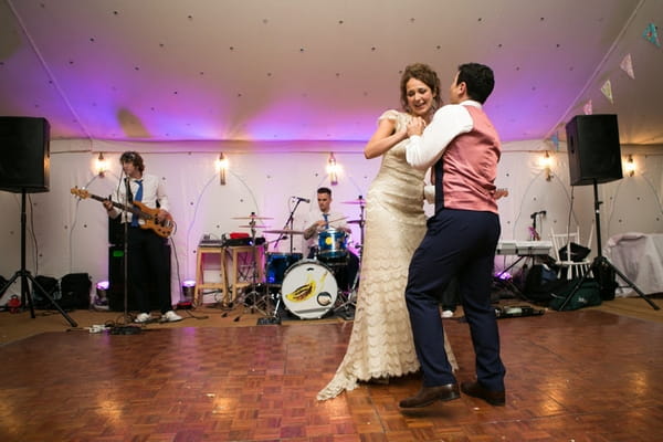 Bride and groom dancing