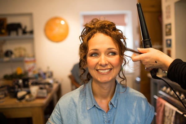 Bride having hair done