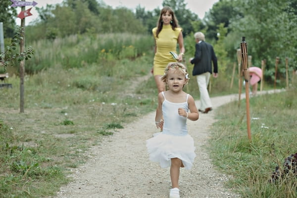 Young girl walking down path