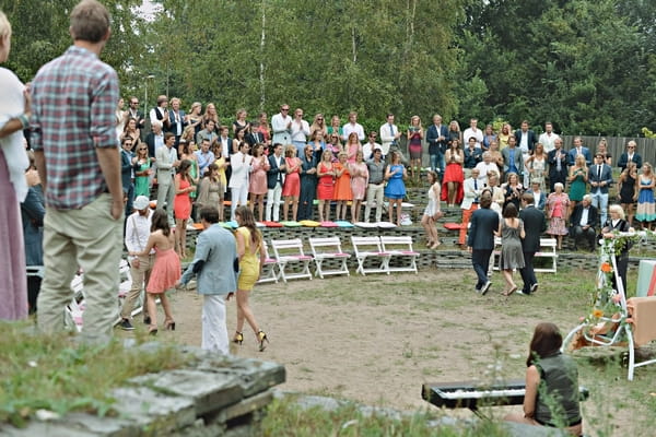 Wedding guests taking seats in Amphitheatre