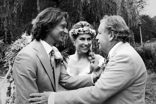 Bride, groom and father