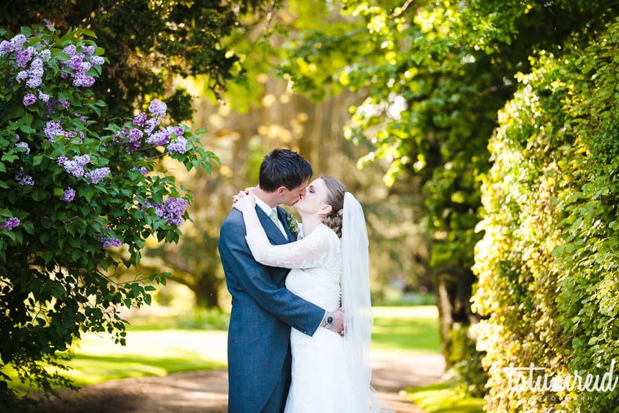 Bride and groom kissing