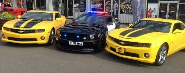 Transformers cars Barricade and Bumblebee available for wedding hire