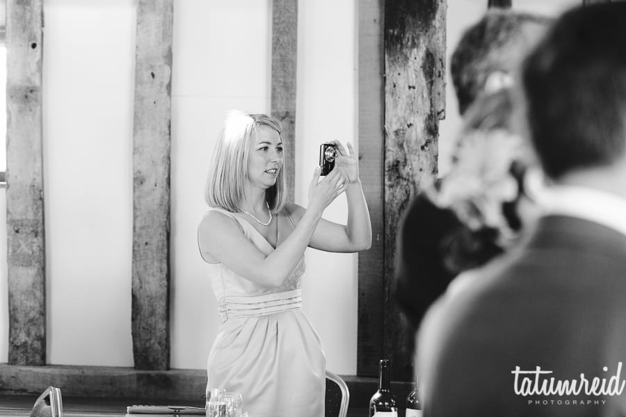 Wedding guest taking picture