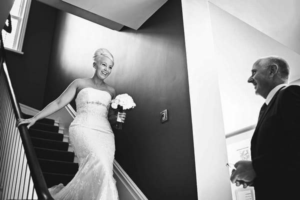 Bride walking down stairs - Picture by Martin Makowski Photography