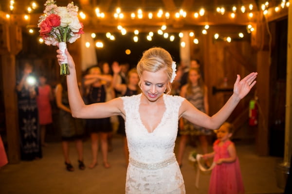 Bride about to throw bouquet