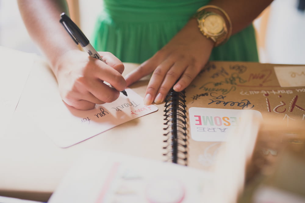 Writing in wedding guest book