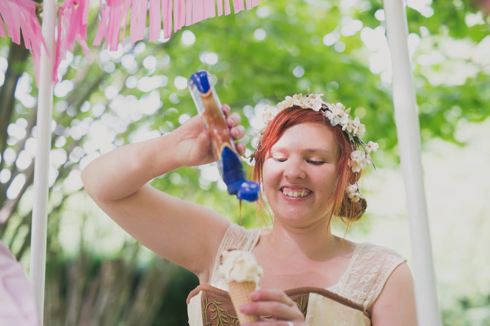 Bride pouring sauce on ice cream