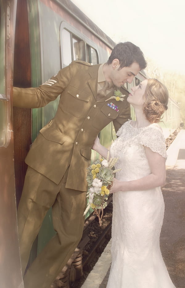 1920's bride saying goodbye to groom on train